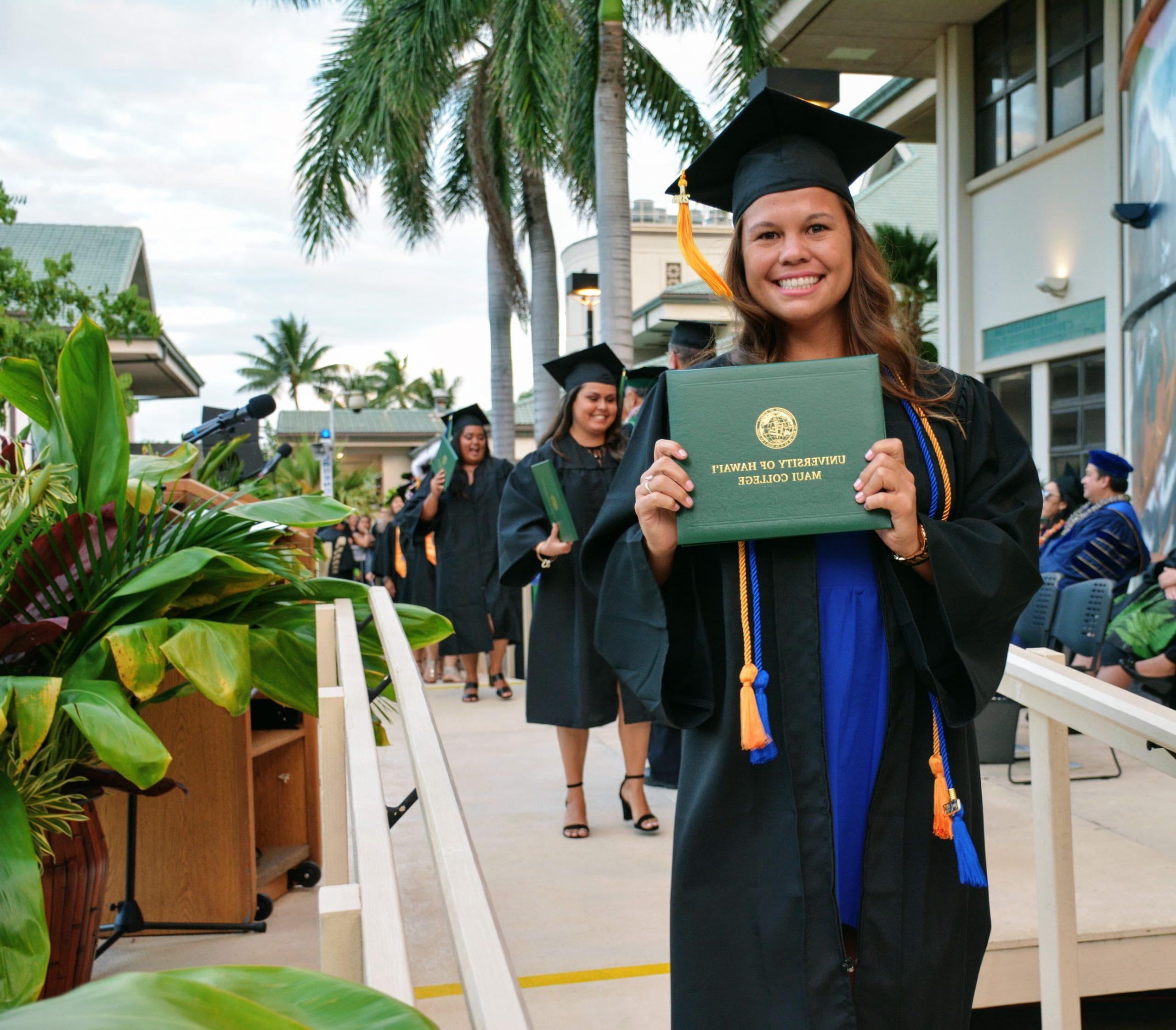 Student with their diploma on graduation